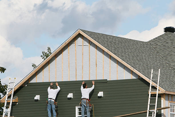 Professional Siding technician working in Modena, PA